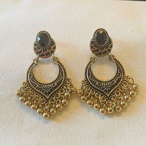 Lightweight black and gold color earrings. Indian style